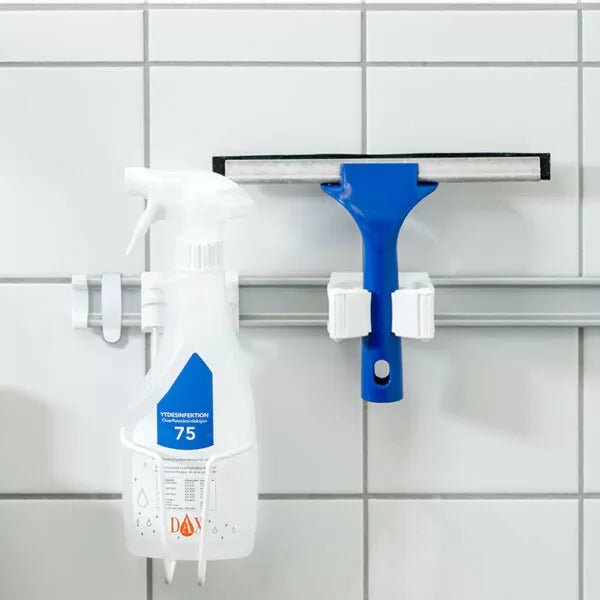Toolflex One spray bottle holder mounted on wall storage rail