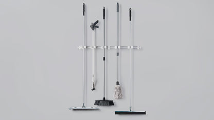 Toolflex One assembly showing holders mounted on rail for wall-mounted tool storage system